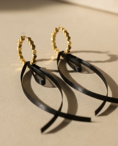 Przejdź do produktu Złote kolczyki ze wstążką